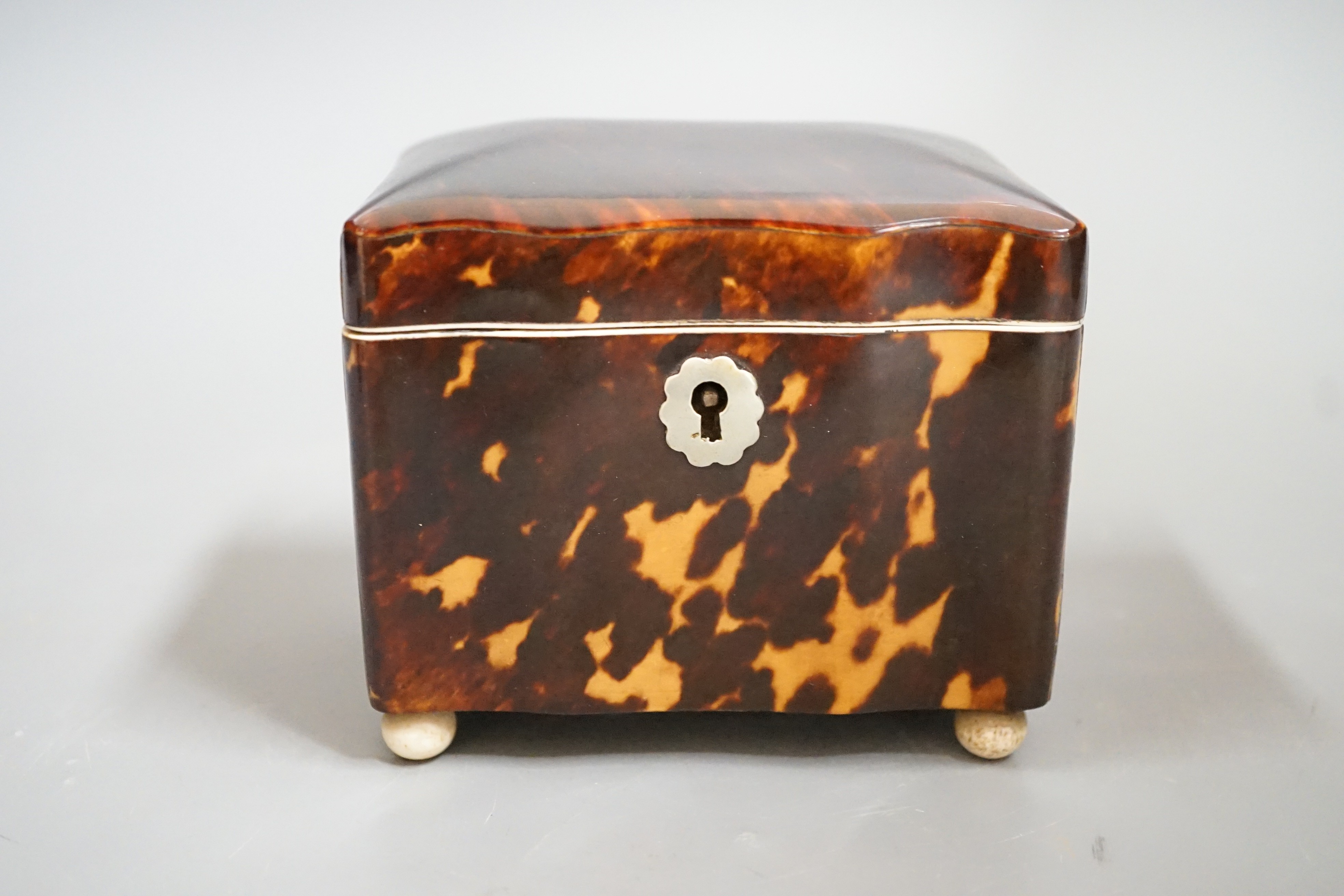 A rare small 19th century tortoiseshell and ivory mounted tea caddy, 9cms wide x 10cms high